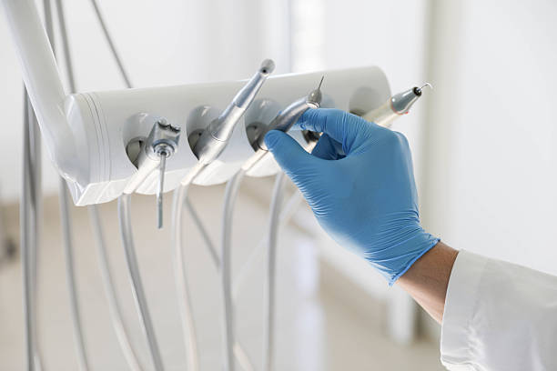 Professional Tooth Extraction technician working in La Grange, NC